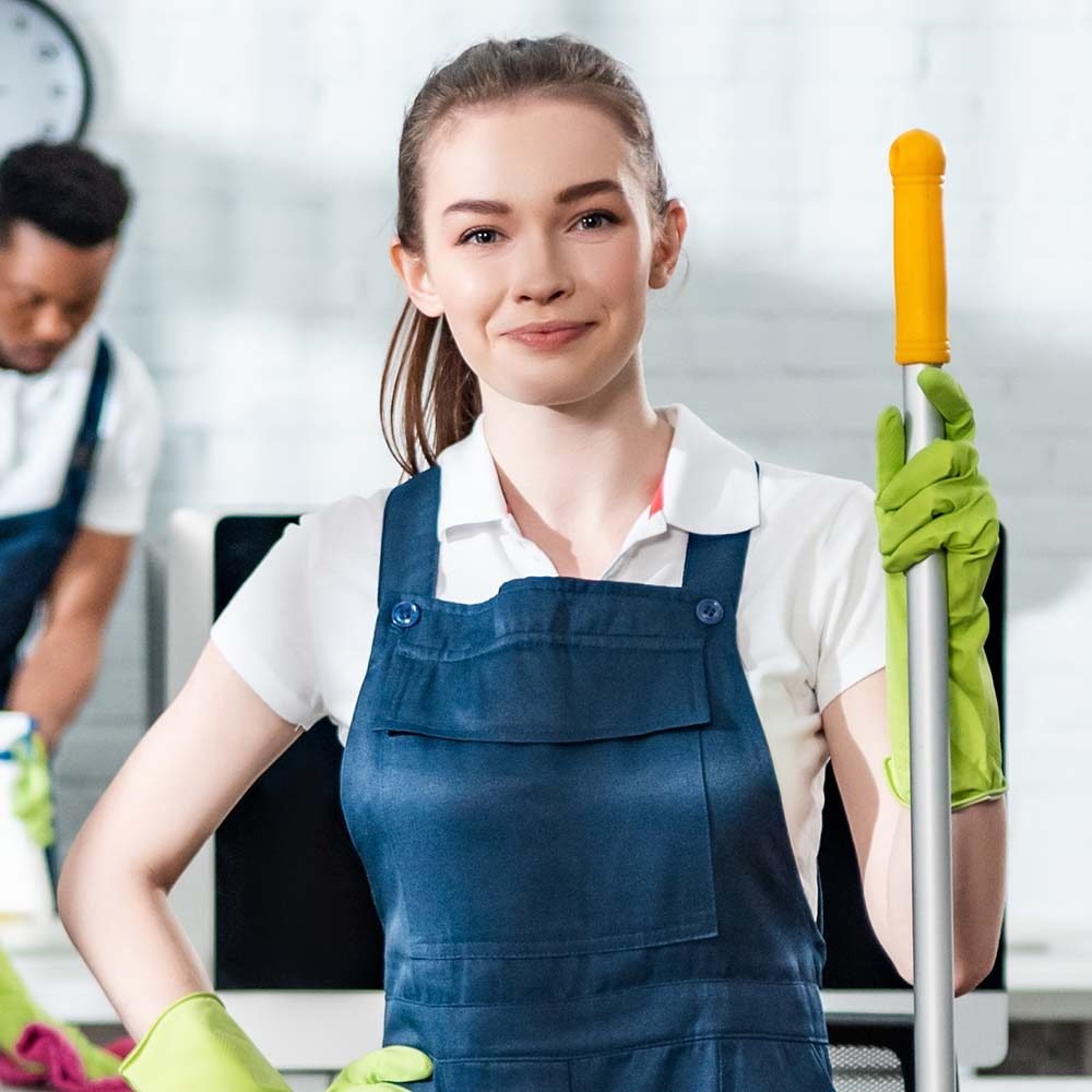 "Residential Cleaning Orlando: Lisa, expert cleaner, scrubbing kitchen sinks and countertops to perfection."