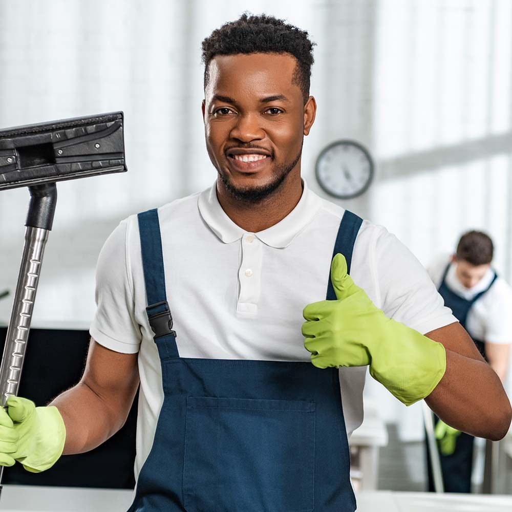"Residential Cleaning Orlando: James, dedicated cleaning professional, wiping down windows for a spotless finish."